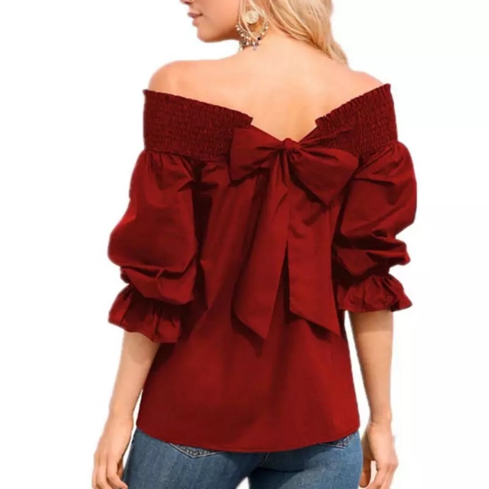 Wine red blouse.